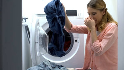 How To Clean A Smelly Washer (And Keep It Smelling Fresh)